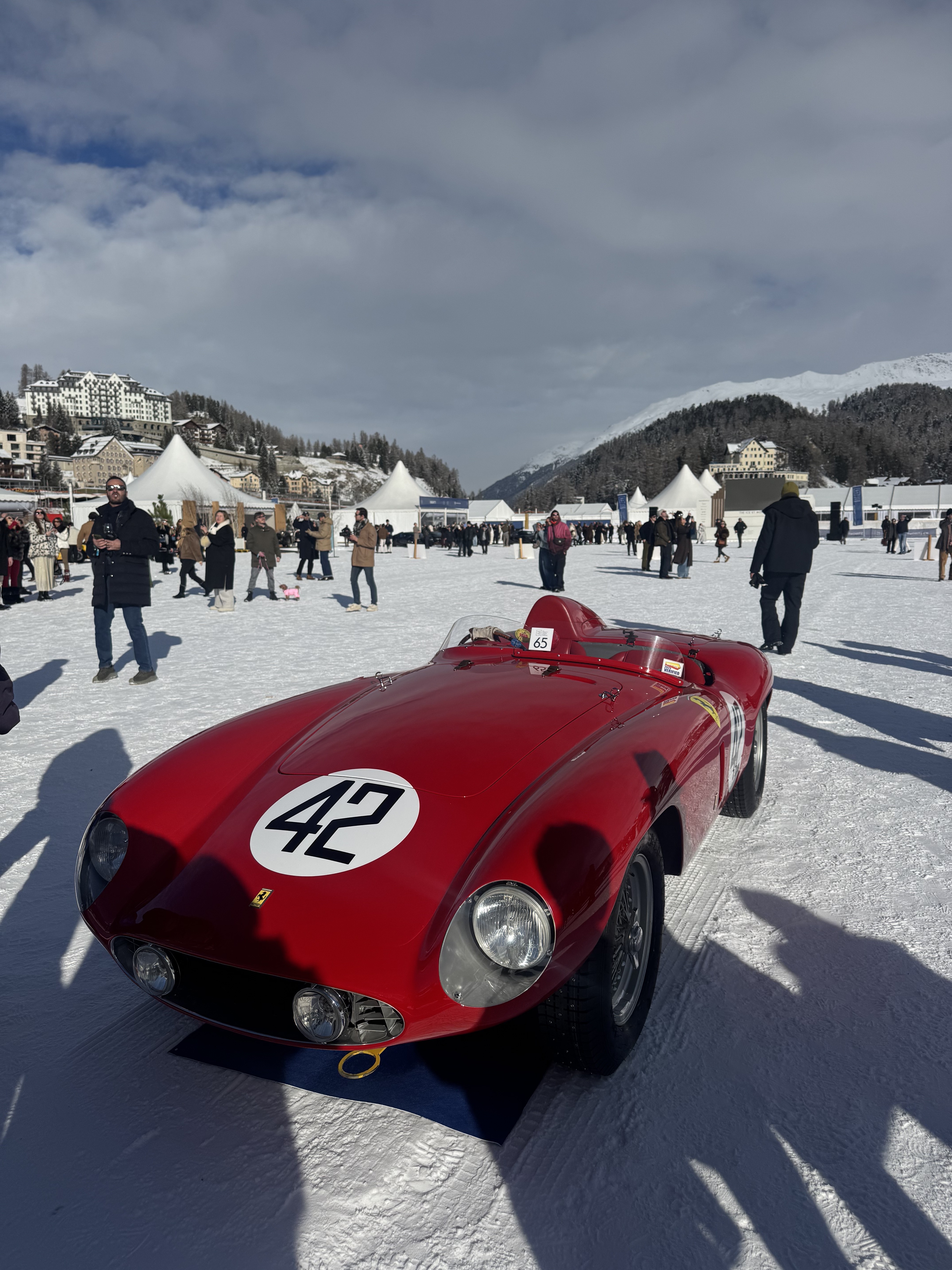 Red vintage Ferrari #42 on the frozen lake at I.C.E. St Moritz