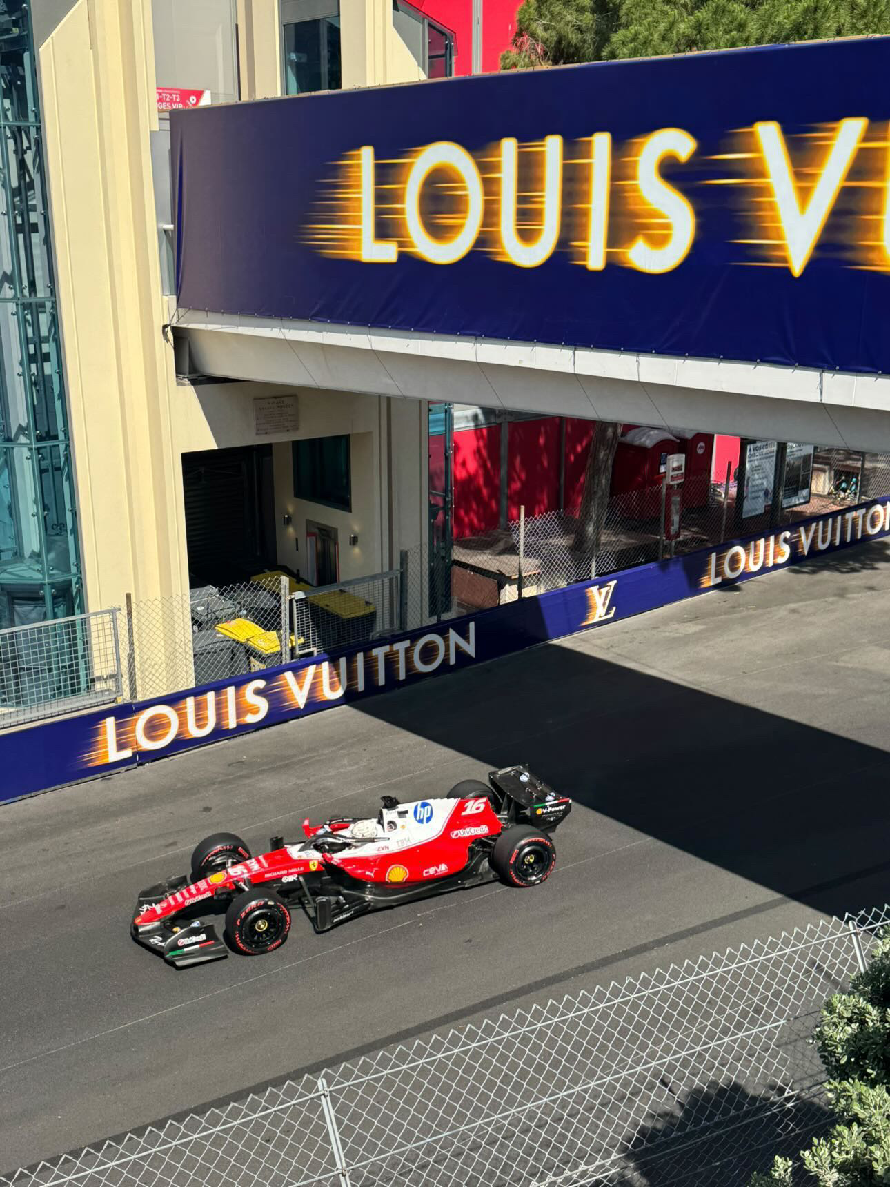 Ferrari Formula 1 car under the Louis Vuitton banner at the Monaco Grand Prix